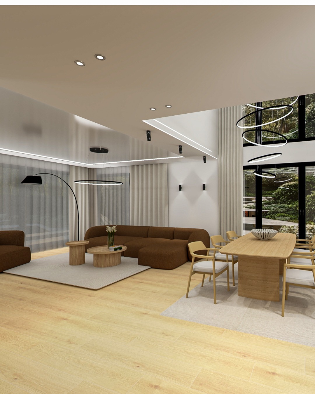 Wnętrze salonu z brązową sofą modułową, drewnianym stołem jadalnym i dużymi oknami z widokiem na ogród. Nowoczesne oświetlenie sufitowe i podłoga z paneli.