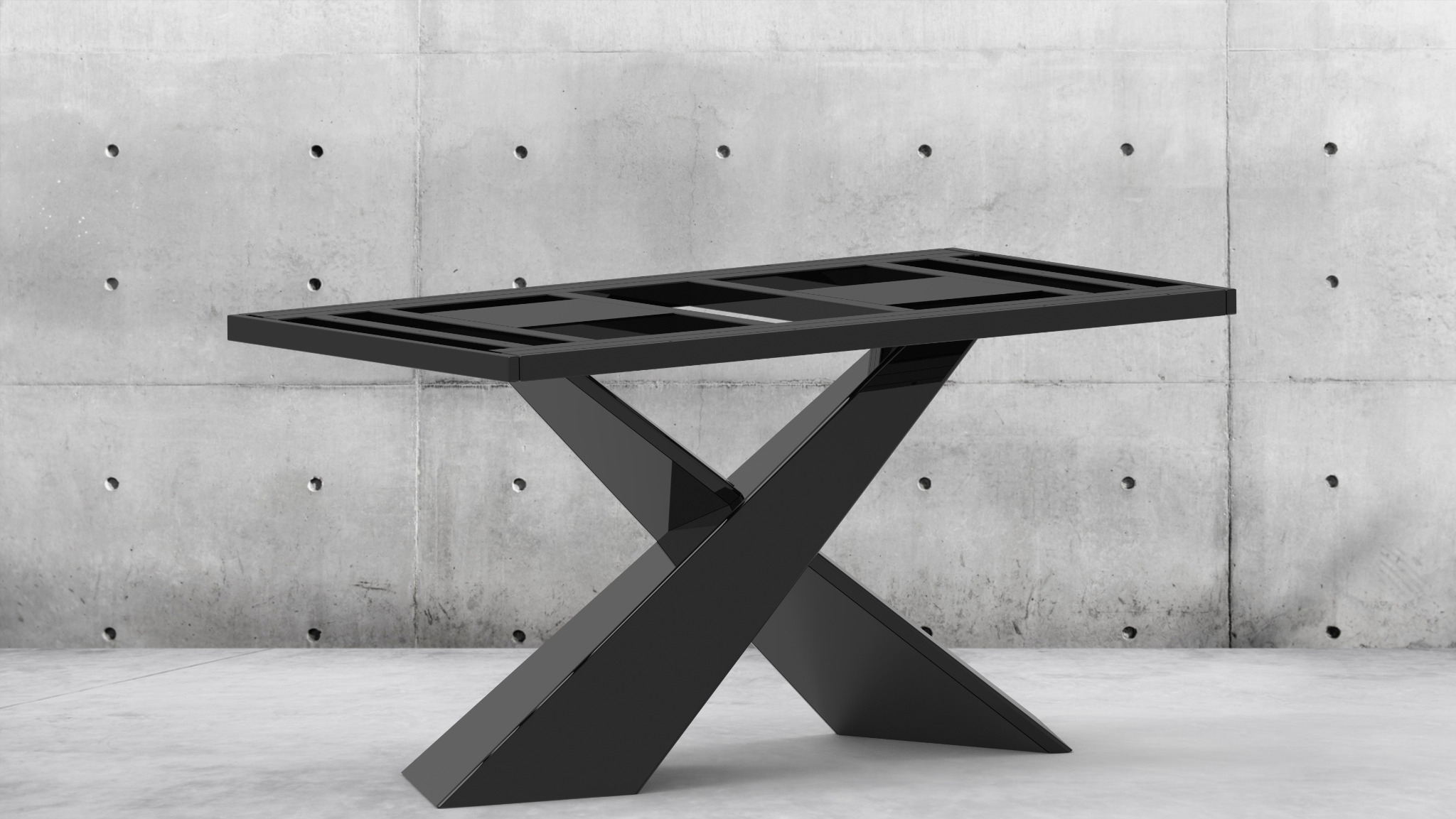 Czarna, metalowa konstrukcja stołu z geometryczną podstawą na tle surowego betonu. Minimalistyczny design, widoczne spawy i precyzyjne łączenia elementów.