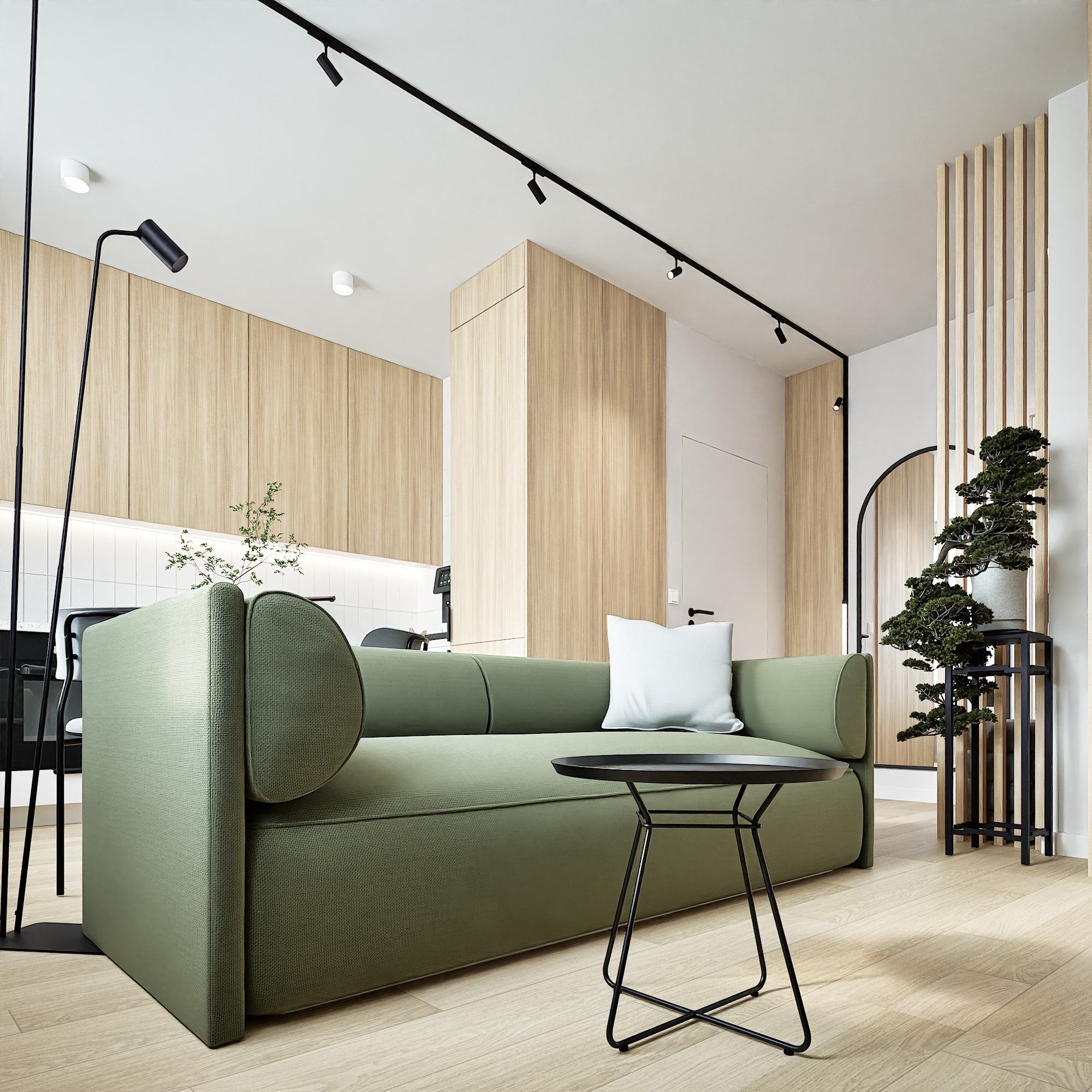 Stylowy salon z zieloną sofą, stolikiem kawowym i elementami drewna. Minimalistyczne oświetlenie punktowe i dekoracyjny parawan z drewnianych listew.