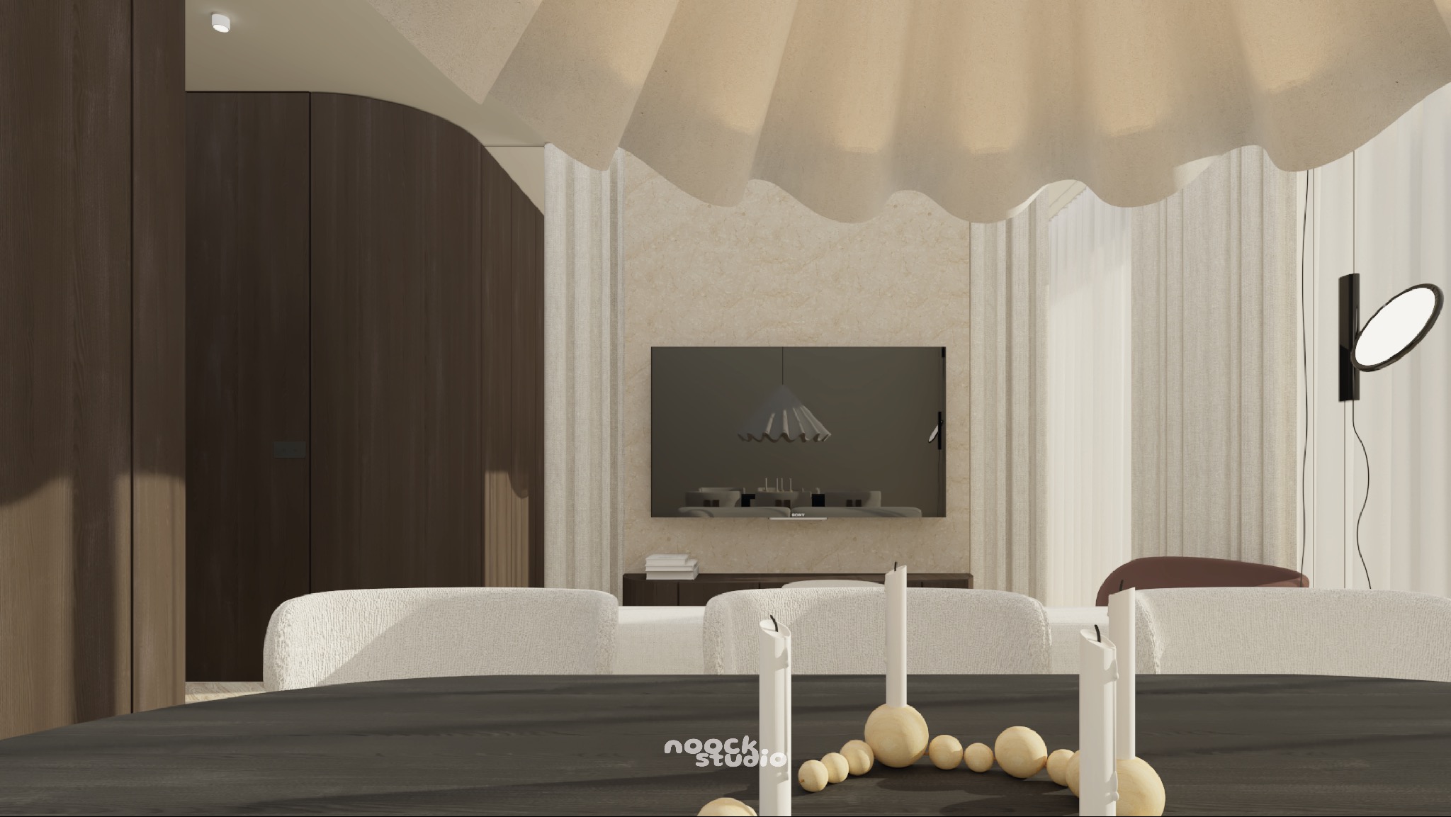 Minimalistyczne wnętrze jadalni z ciemnym stołem, białymi krzesłami i dekoracyjną lampą. Telewizor na ścianie. Projekt w neutralnej palecie barw.