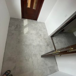 Hubert cap - Remonty biur Biłgoraj