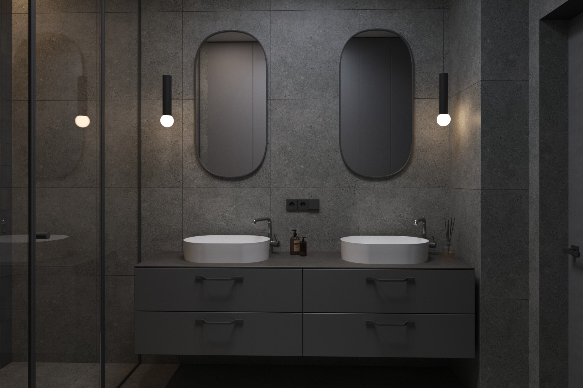 Nowoczesna łazienka w odcieniach szarości z dwoma umywalkami, owalnymi lustrami i minimalistycznym oświetleniem. Płytki imitujące kamień na ścianach i podłodze.