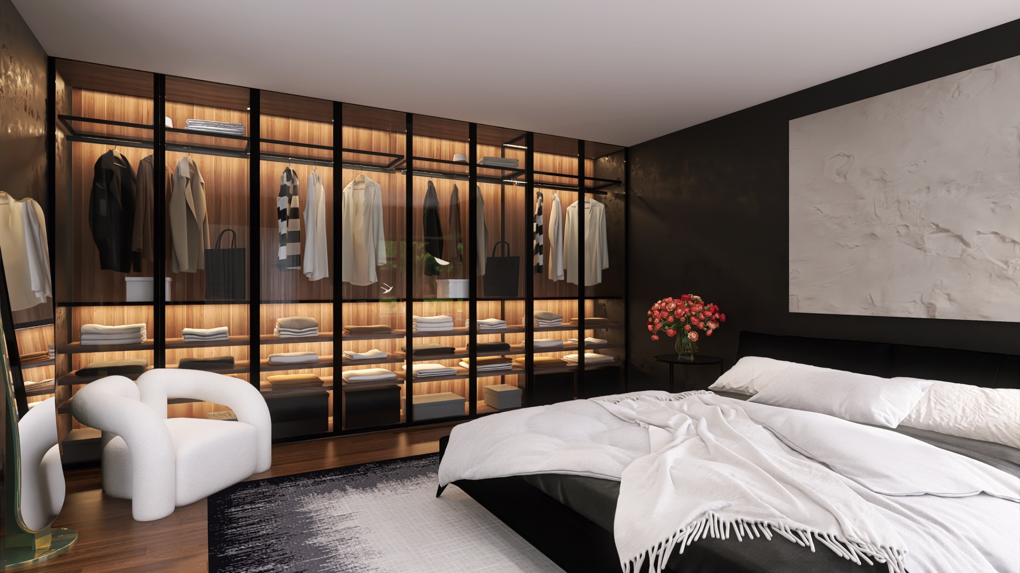 Nowoczesna sypialnia z dużą, podświetlaną szafą wnękową z przeszklonymi drzwiami, białym fotelem i łóżkiem z kwiatami. Minimalistyczny design, ciemne ściany, jasna pościel.