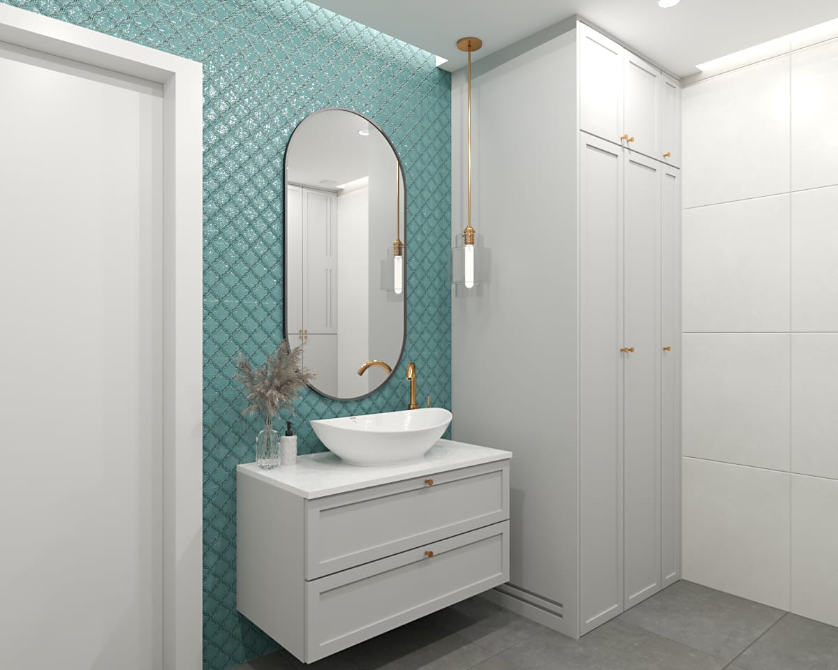 Nowoczesna łazienka z turkusową mozaiką, owalnym lustrem i białą umywalką nablatową na szarej szafce. Minimalistyczne oświetlenie i biała zabudowa meblowa.