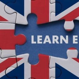 Zarasprint LTD - Puzzle z flagą Wielkiej Brytanii, w środku napis 'Learn English'. Grafika promująca naukę języka angielskiego, korepetycje.