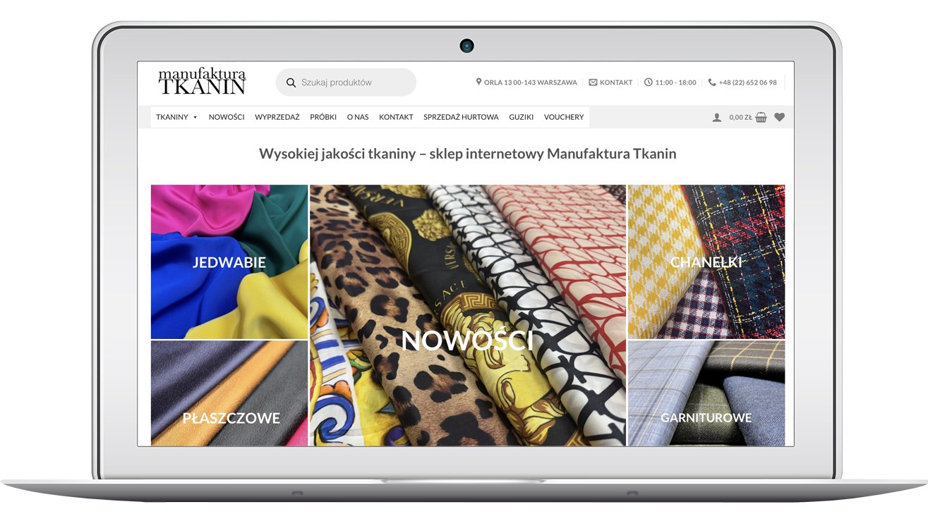 Ekran laptopa prezentuje stronę sklepu internetowego Manufaktura Tkanin z ofertą wysokiej jakości materiałów: jedwabie, tkaniny płaszczowe, chanelki i garniturowe.
