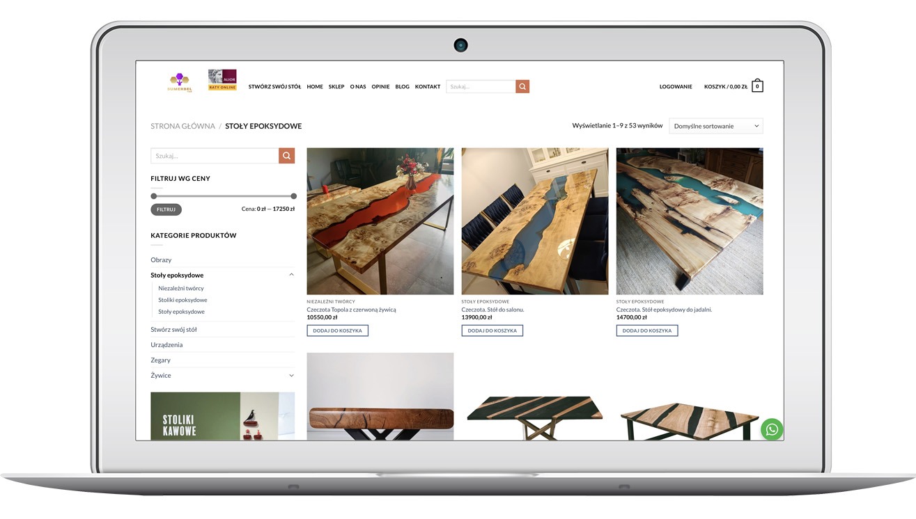 Ekran laptopa prezentuje stronę sklepu internetowego z ofertą stołów epoksydowych. Widoczne filtry, kategorie produktów i przykładowe stoły z żywicą.