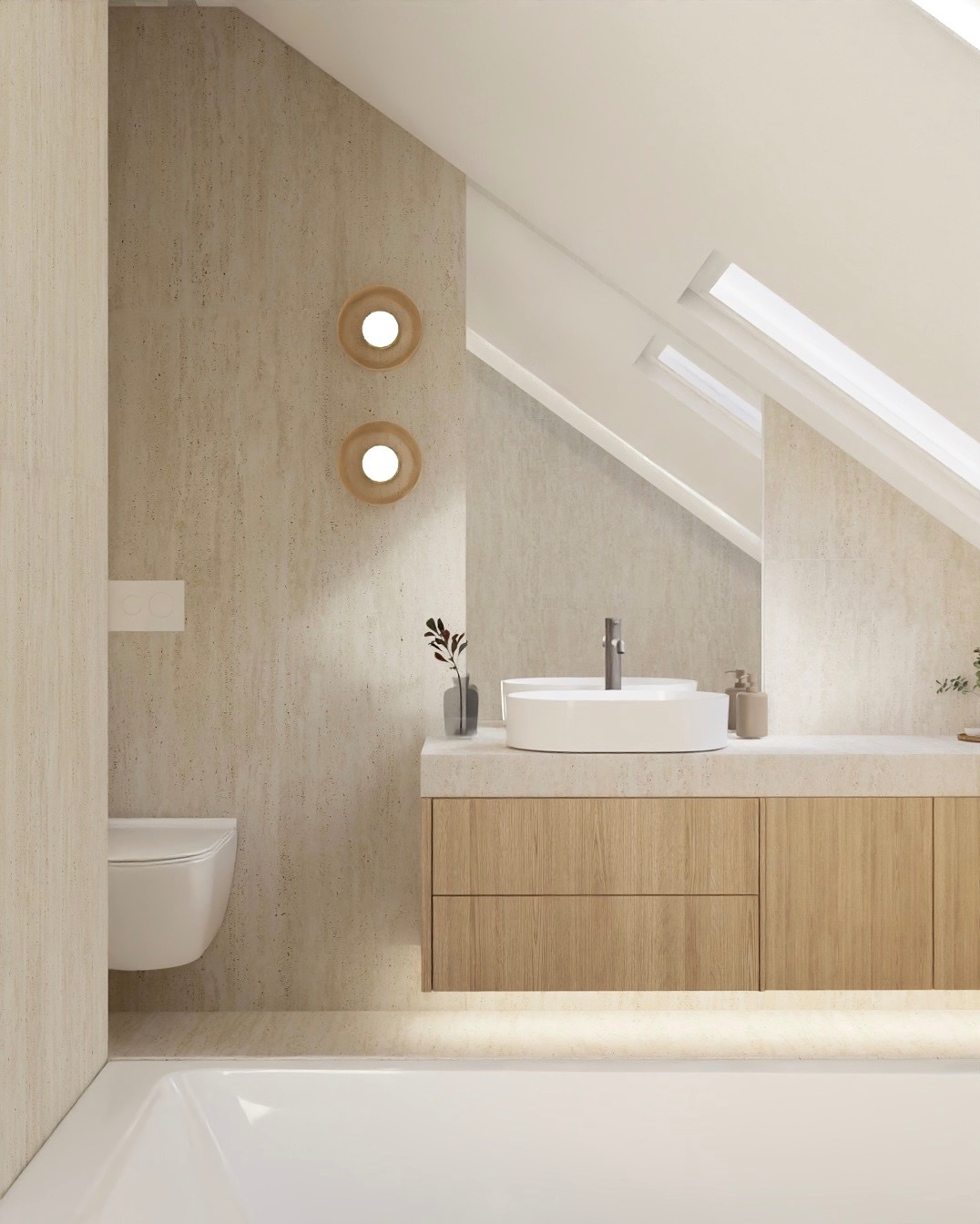 Jasna łazienka na poddaszu z oknami dachowymi. Umywalka nablatowa, drewniana szafka pod umywalką z podświetleniem LED. Beżowe płytki imitujące kamień na ścianach.
