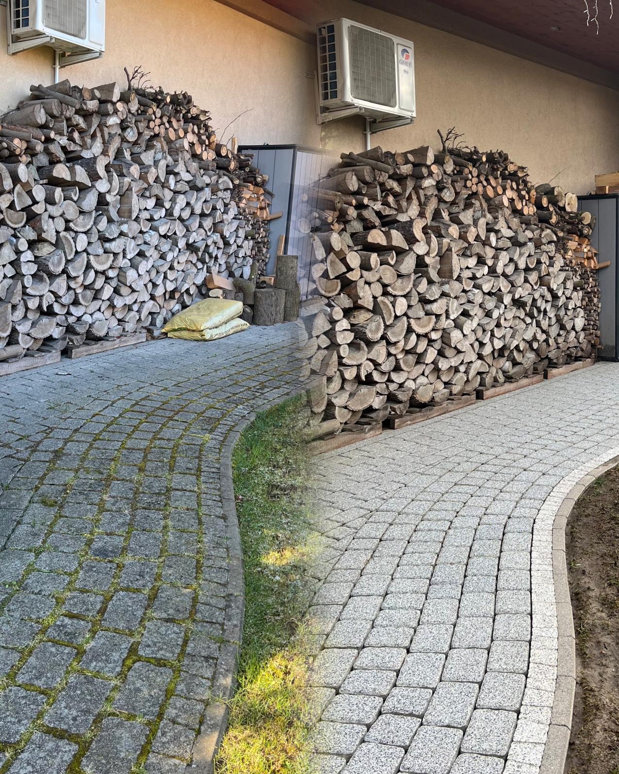 Kostka brukowa przed i po czyszczeniu, z widocznym stosem drewna opałowego w tle. Efekt czyszczenia uwidoczniony na połowie powierzchni.