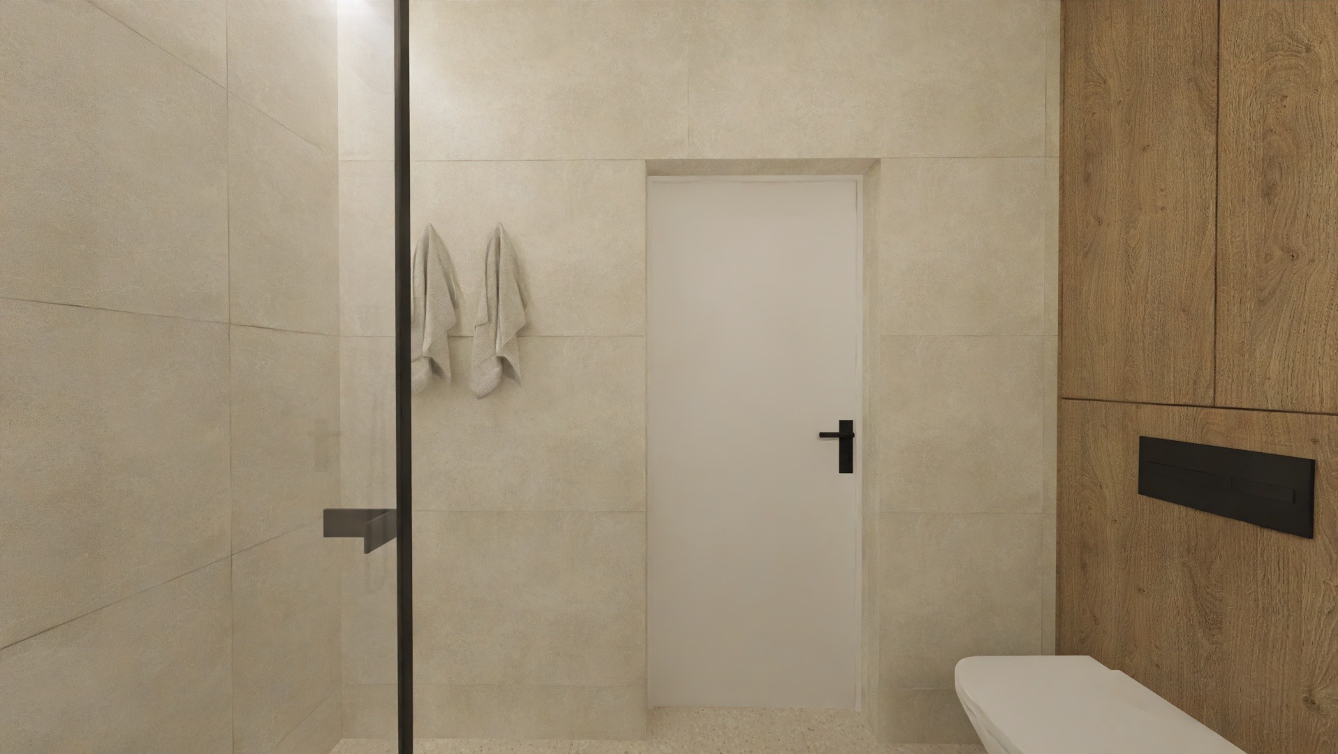 Minimalistyczna łazienka z beżowymi płytkami, drewnianą zabudową i białymi ręcznikami. Kabina prysznicowa ze szklaną ścianką i czarnym uchwytem.