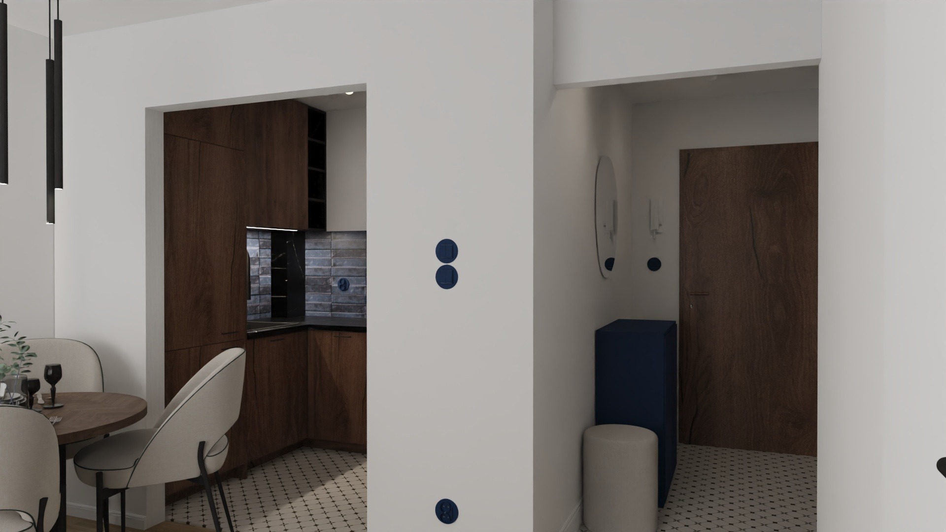 Wnętrze mieszkania z ciemną drewnianą zabudową kuchenną, okrągłym stołem z krzesłami i widokiem na przedpokój z szafką i lustrem. Białe ściany i wzorzysta podłoga.