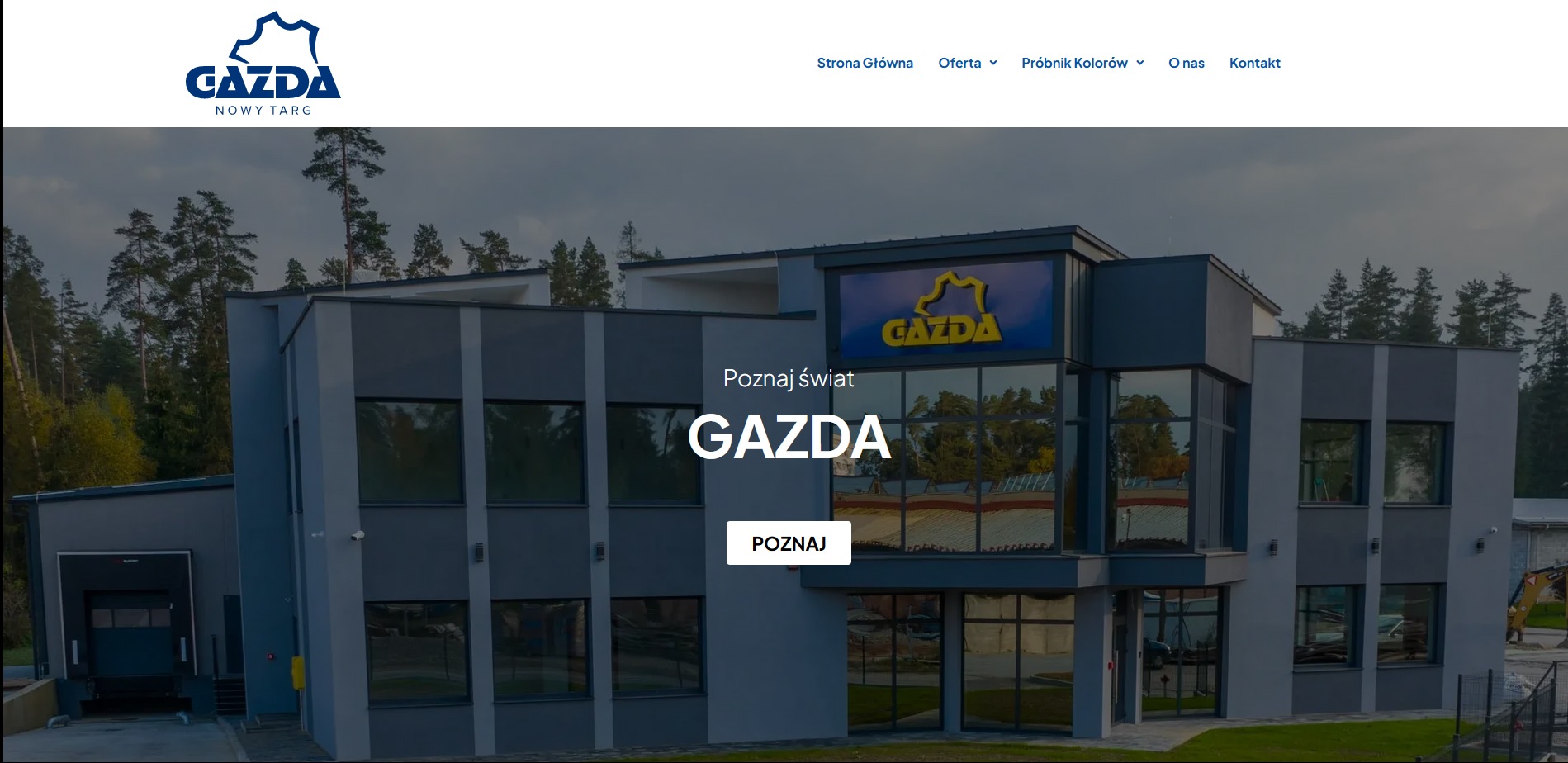 Nowoczesna strona internetowa firmy Gazda z Nowego Targu. Budynek firmy w tle, menu nawigacyjne u góry. Minimalistyczny design, stonowana kolorystyka.