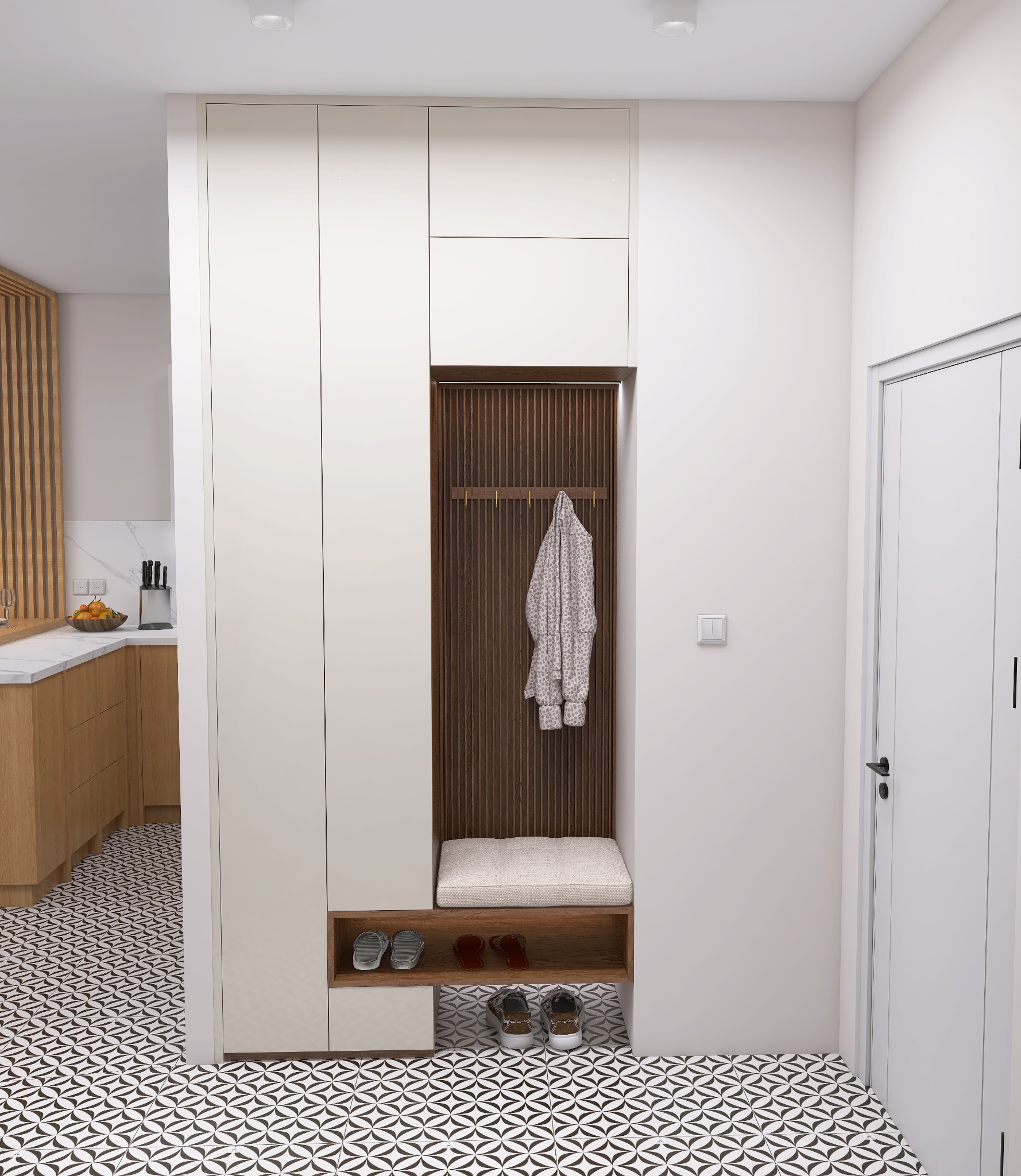Nowoczesny przedpokój z szafą w zabudowie, drewnianym panelem z wieszakami, siedziskiem i półkami na buty. W tle widoczna kuchnia z drewnianymi elementami.