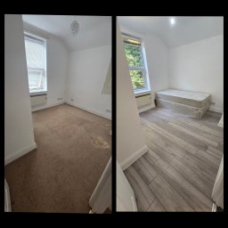 Kompleksowe wykonczenia wnętrz - Zdjęcie 'przed i po' prezentujące remont pokoju: stara wykładzina dywanowa kontra nowa podłoga z paneli imitujących drewno. Widoczne okno i grzejnik.