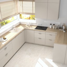 LeoArt - Jasna, nowoczesna kuchnia z drewnianymi blatami, widziana z góry. Minimalistyczne szafki, okno z żaluzjami i subtelne dodatki tworzą przytulną przestrzeń.