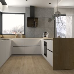 LeoArt - Nowoczesna kuchnia w bieli i drewnie z dużym oknem i widokiem na zimowy krajobraz. Minimalistyczny design, oświetlenie LED i wiszące lampy.