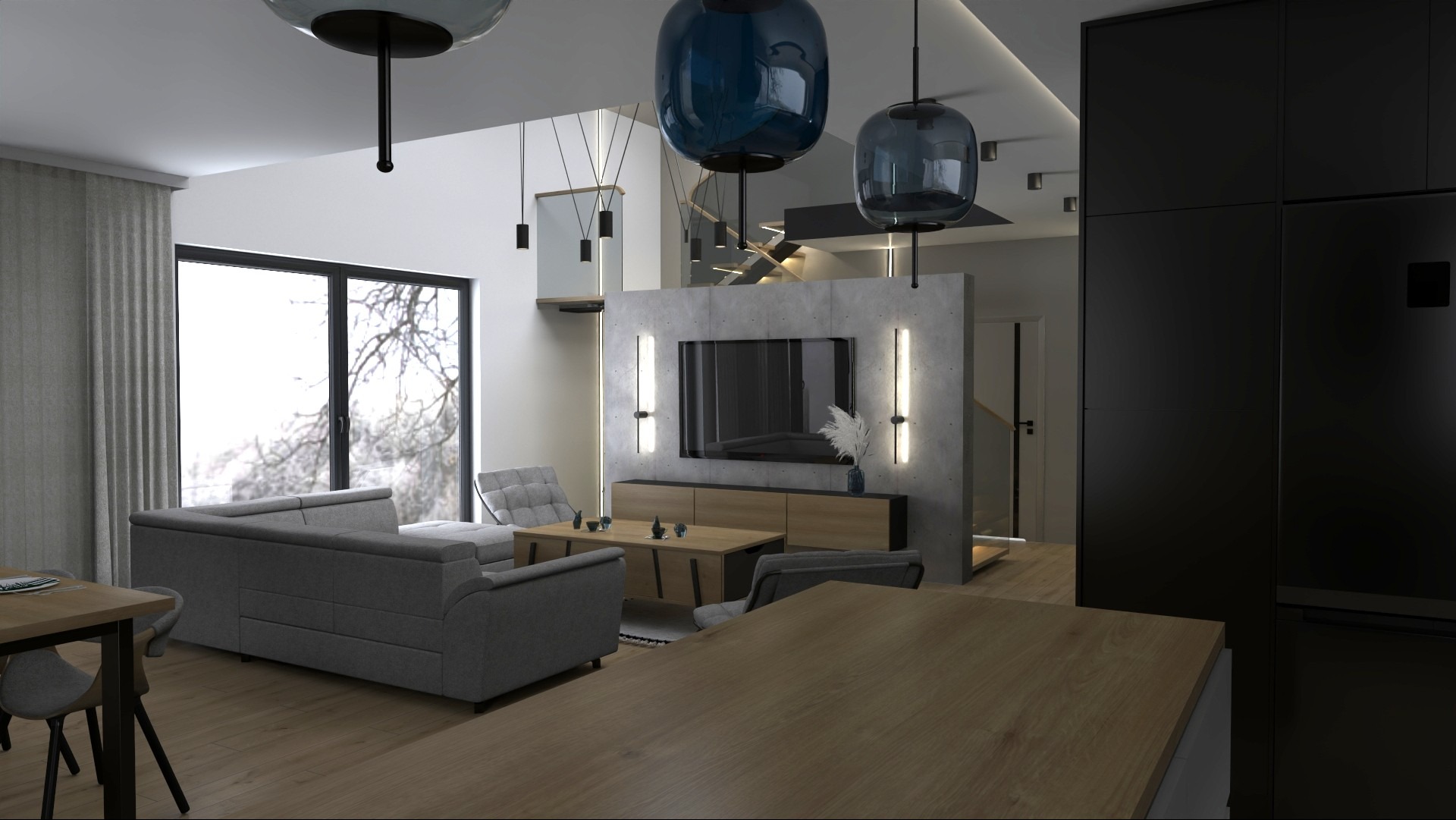 Nowoczesny salon z szarą sofą, drewnianym stołem i betonową ścianą z telewizorem. Niebieskie lampy wiszące dodają koloru. Widok na schody i okno z zimowym krajobrazem.