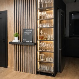 RW MEBLE Weronika Rechul - Nowoczesny kącik z drewnianymi akcentami