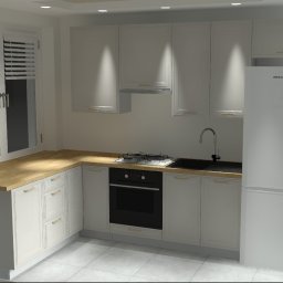 Stolarnia Gwiaździsta Grzegorz Kazanowski - Jasna kuchnia z drewnianym blatem, białymi szafkami i sprzętem AGD. Widok na okno z żaluzjami i płytę grzewczą. Minimalistyczny design.