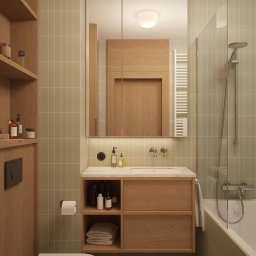 Muka Studio Agnieszka Zielińska-Chmura - Nowoczesna łazienka w odcieniach beżu i zieleni z drewnianymi akcentami. Umywalka z szafką, lustro z oświetleniem, toaleta i wanna z parawanem.