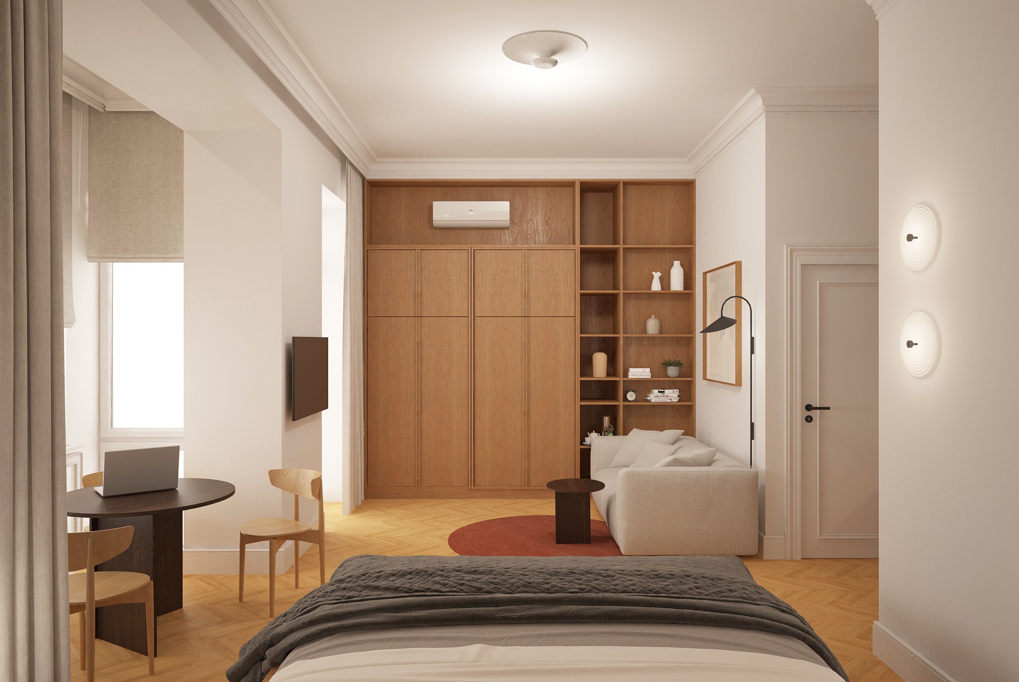 Jasne wnętrze apartamentu z drewnianą zabudową, sofą i miejscem do pracy. Minimalistyczny design z akcentami kolorystycznymi i nowoczesnym oświetleniem.