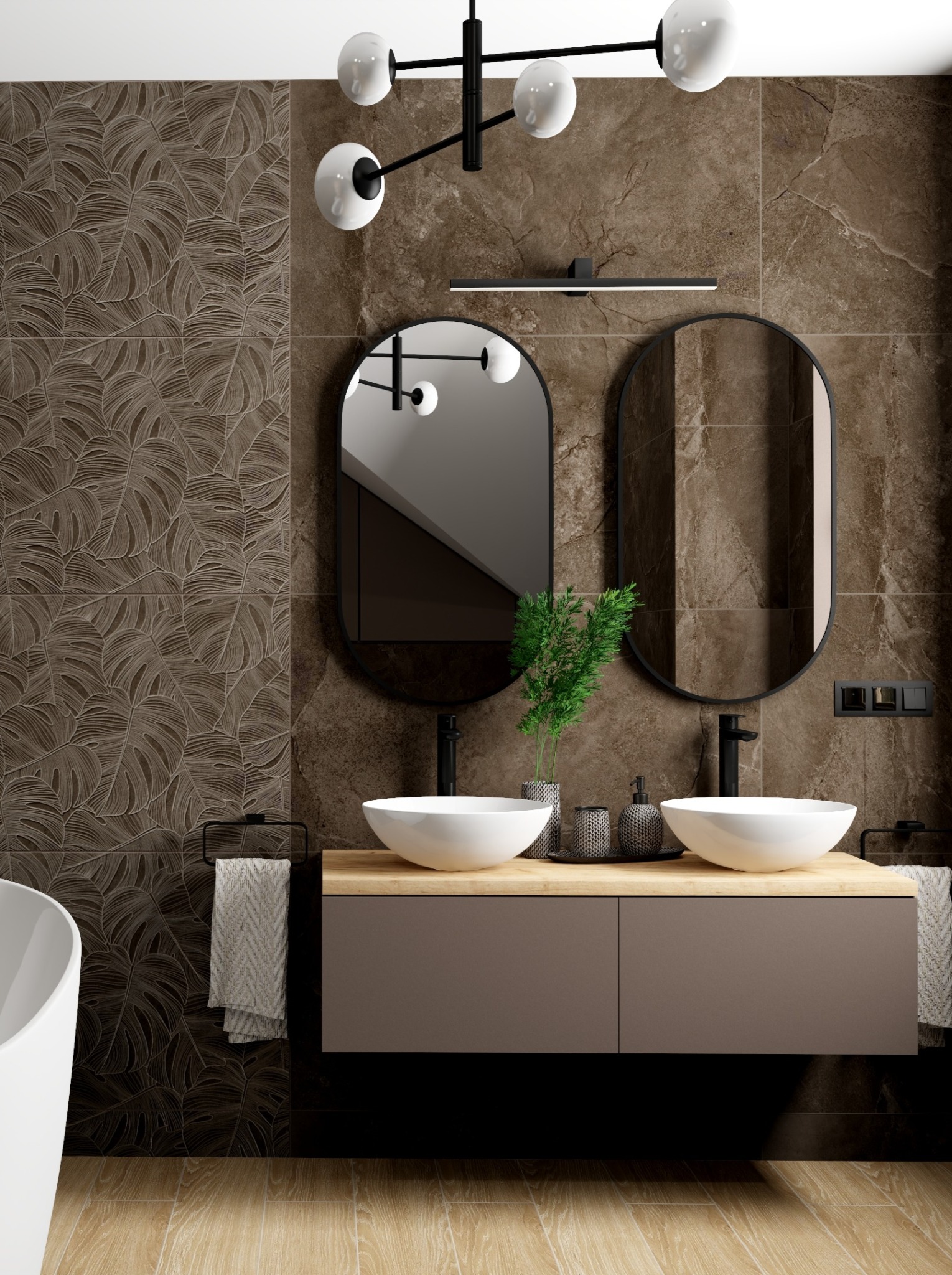 Nowoczesna łazienka z brązowymi płytkami w liście monstery, podwójną umywalką nablatową i okrągłymi lustrami. Oświetlenie sufitowe i drewnopodobna podłoga.