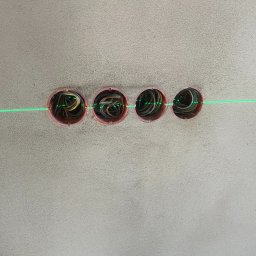 ELMARB Marcin Baran - Cztery puszki elektryczne w ścianie, wyrównane laserowo, z widocznymi przewodami wewnątrz. Ściana o szarej, surowej fakturze.