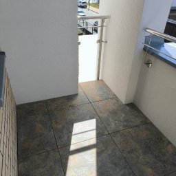 Perfekcyjne Wykończenia Marek Nowakowski - Zrealizowany taras kilienta płytki na wspornikach (taras wentylowany).