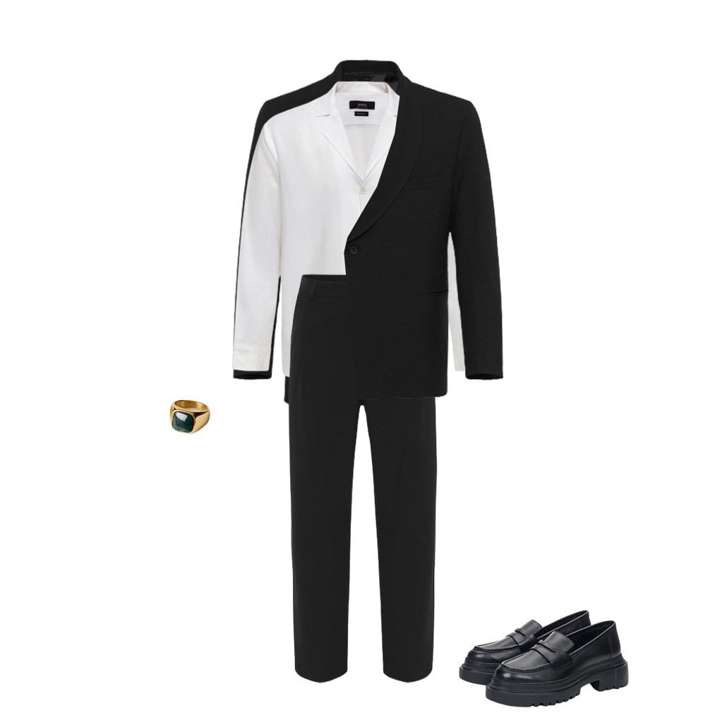 Dwukolorowy garnitur (czarno-biały) z czarnymi spodniami i masywnymi mokasynami. Złoty sygnet z zielonym oczkiem. Prezentacja stylizacji.
