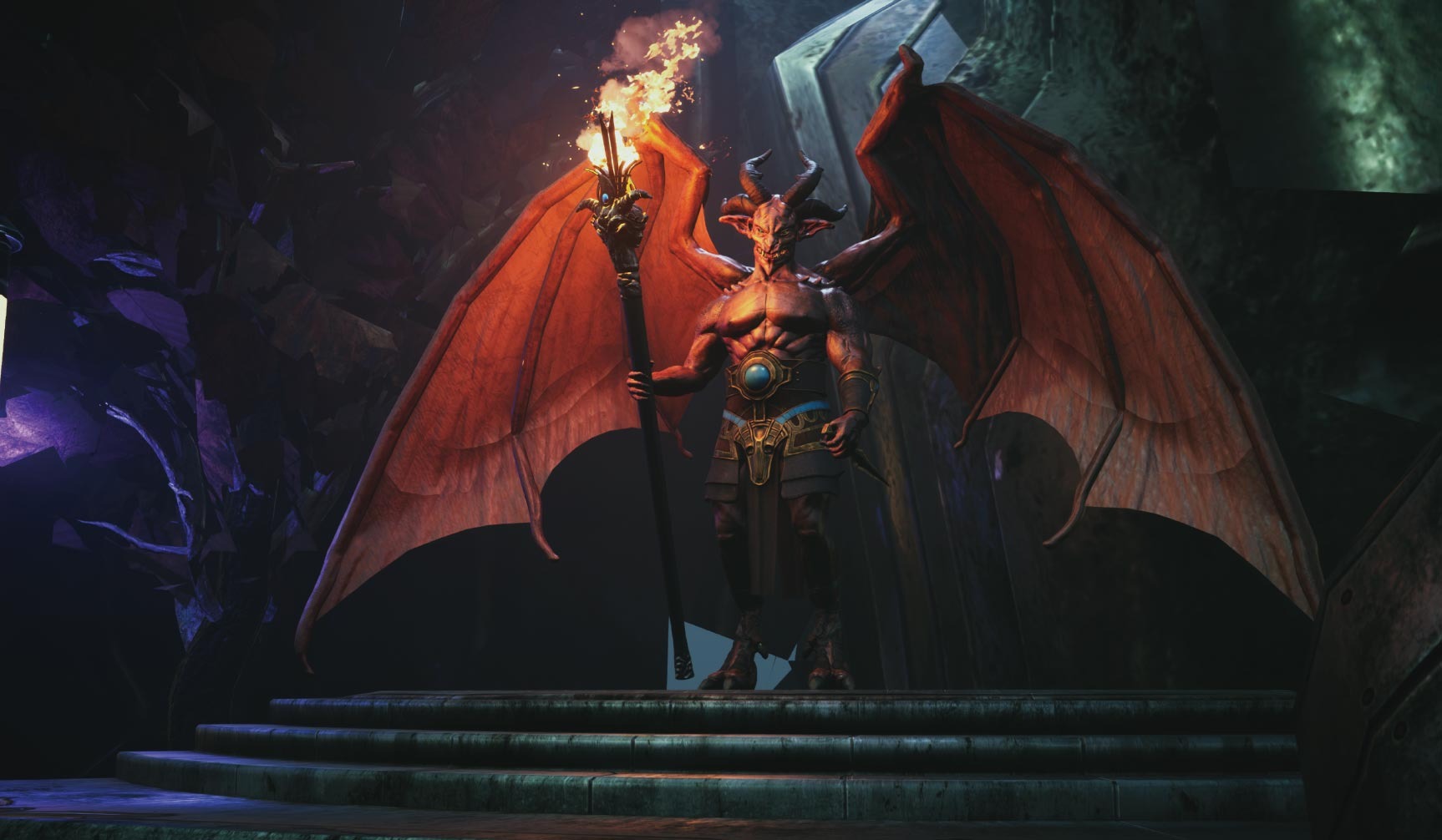 Grafika 3D przedstawia demona ze skrzydłami, rogami i płonącą pochodnią, stojącego na kamiennych schodach w mrocznej scenerii. Dominują ciemne barwy z akcentami ognia.