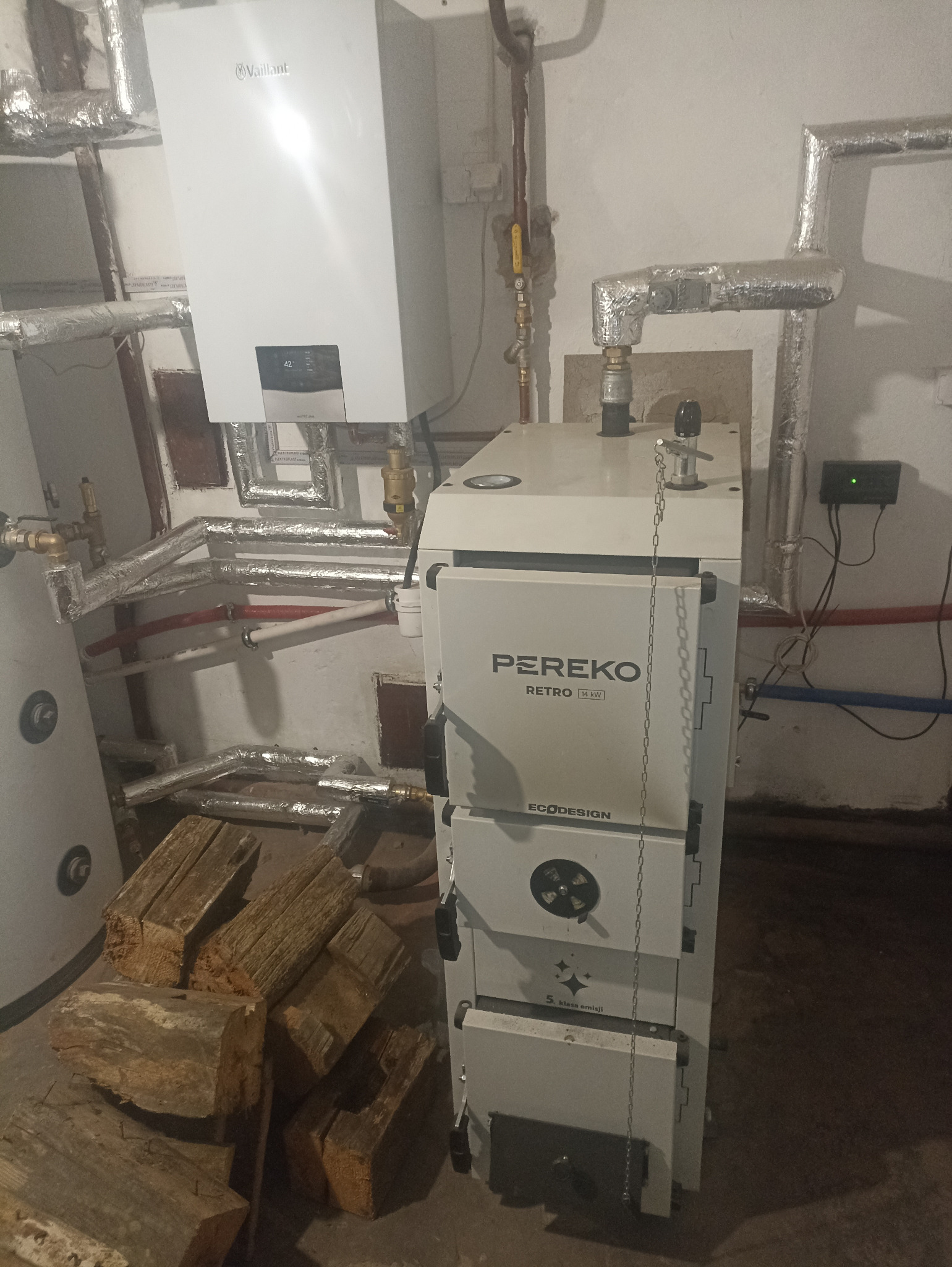 Kotłownia z kotłem gazowym Firmy Vaillant i kotłem zgazowującym Firmy Per Eco wraz ze zbiornikiem akumulacyjnym