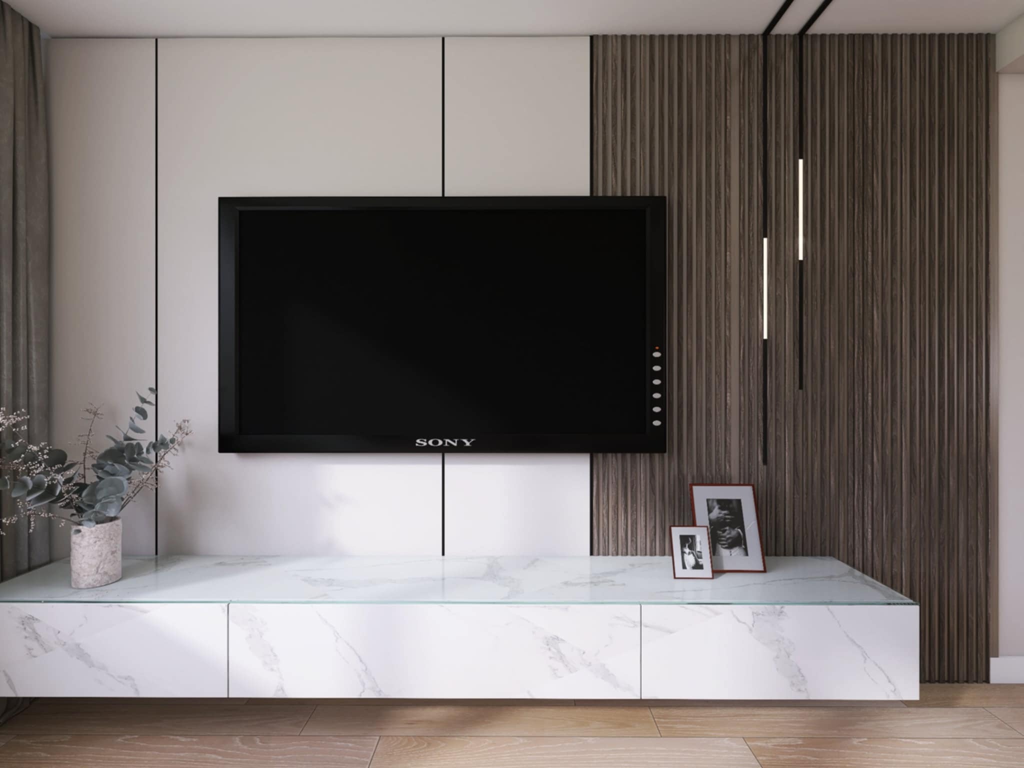Salon z telewizorem Sony na białej szafce z marmurowym wzorem, dekoracje, drewniana ściana z pionowymi panelami i minimalistyczne lampy wiszące.