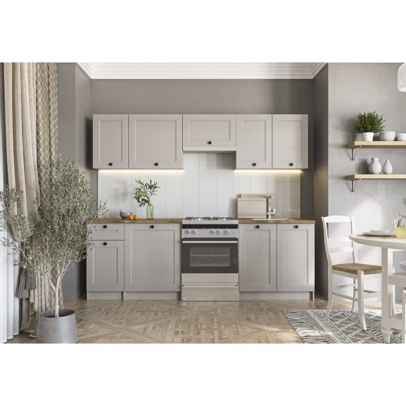 Jasna kuchnia w stylu skandynawskim z drewnianym blatem, białymi płytkami i roślinami. Minimalistyczny design z akcentami natury i ciepłym oświetleniem.