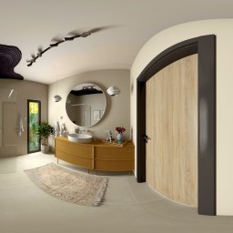 Gra Wnętrz MARIKA GRANSICKA-KUCHTA - Minimalistyczna łazienka z beżowym mikrocementem na ścianach, okrągłym lustrem nad drewnianą szafką i dekoracyjnym dywanem. Widok panoramiczny 360 stopni.
