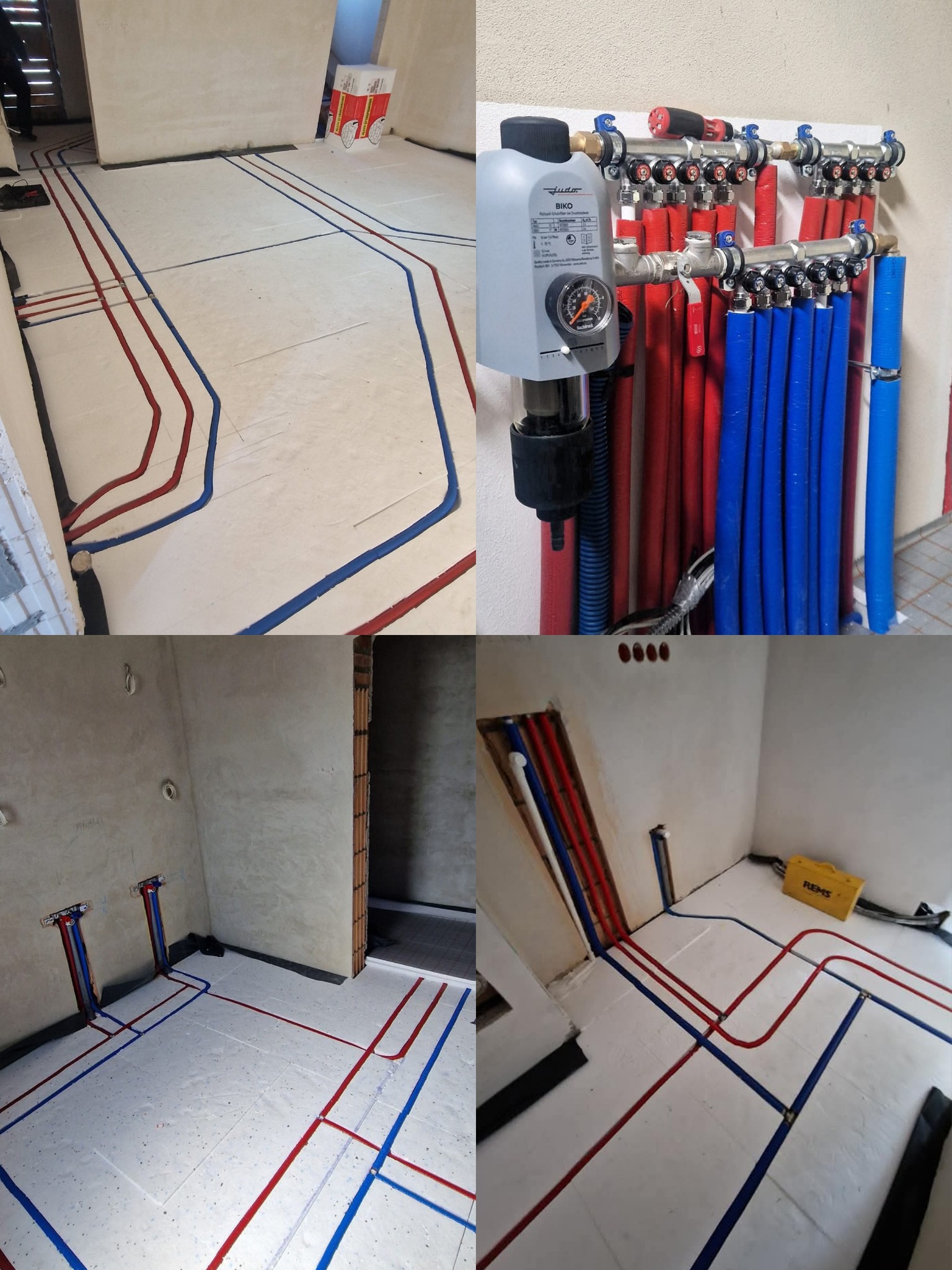 Rozdzielacz z rurami ogrzewania podłogowego w kolorze czerwonym i niebieskim, ułożonymi na białej izolacji. Widoczne narzędzia i elementy instalacji.