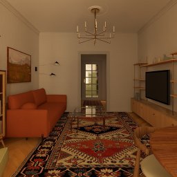 Salon z pomarańczową sofą i wzorzystym dywanem. Na ścianie półki z telewizorem. W tle widoczne drzwi do kolejnego pomieszczenia. Całość w ciepłej tonacji.