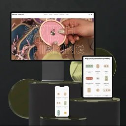 NICE CODE SPÓŁKA Z OGRANICZONĄ ODPOWIEDZIALNOŚCIĄ - Responsywna strona internetowa 'Switch Concept' na monitorze, tablecie i smartfonie, prezentująca ofertę produktów. Minimalistyczny design, ciemne tło, złote akcenty.