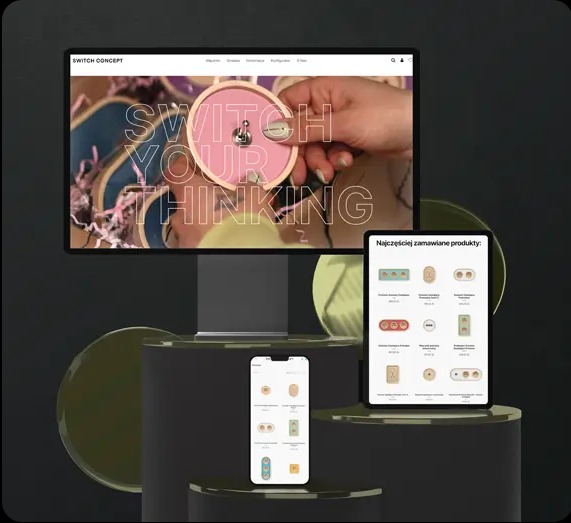 Responsywna strona internetowa 'Switch Concept' na monitorze, tablecie i smartfonie, prezentująca ofertę produktów. Minimalistyczny design, ciemne tło, złote akcenty.