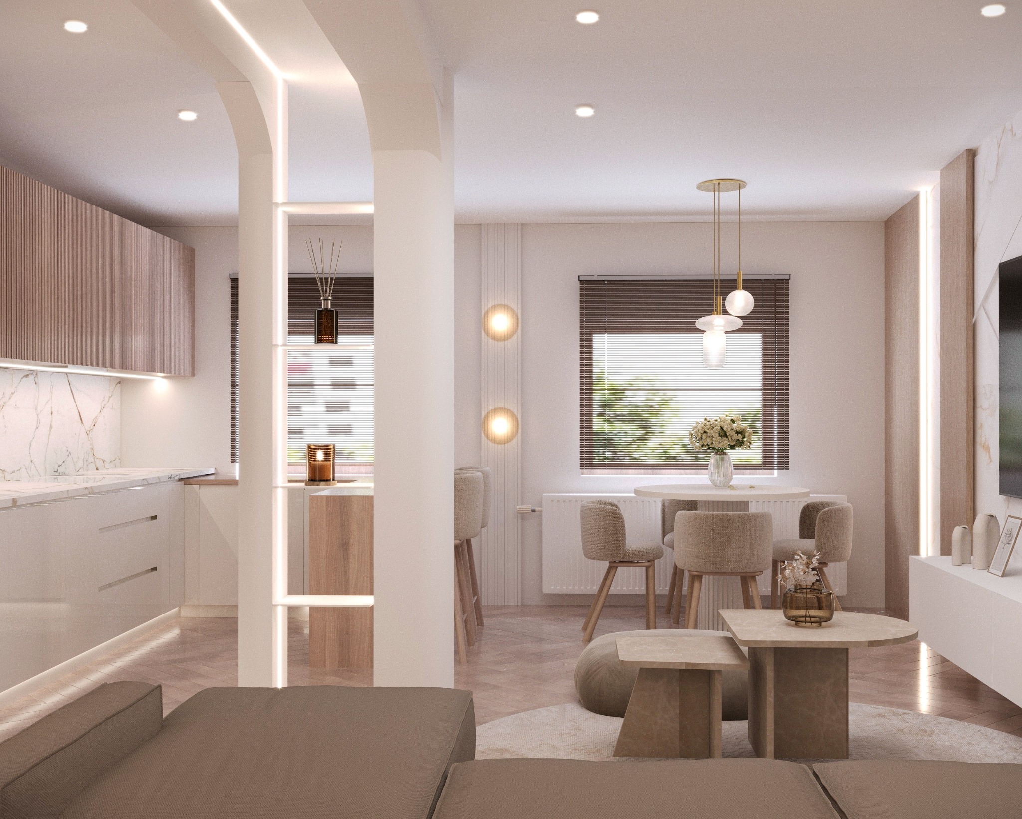 Jasne wnętrze z otwartą kuchnią i jadalnią, oddzielone kolumnami z oświetleniem LED. Neutralna paleta barw, marmurowe blaty i drewniane akcenty. Nowoczesny design.