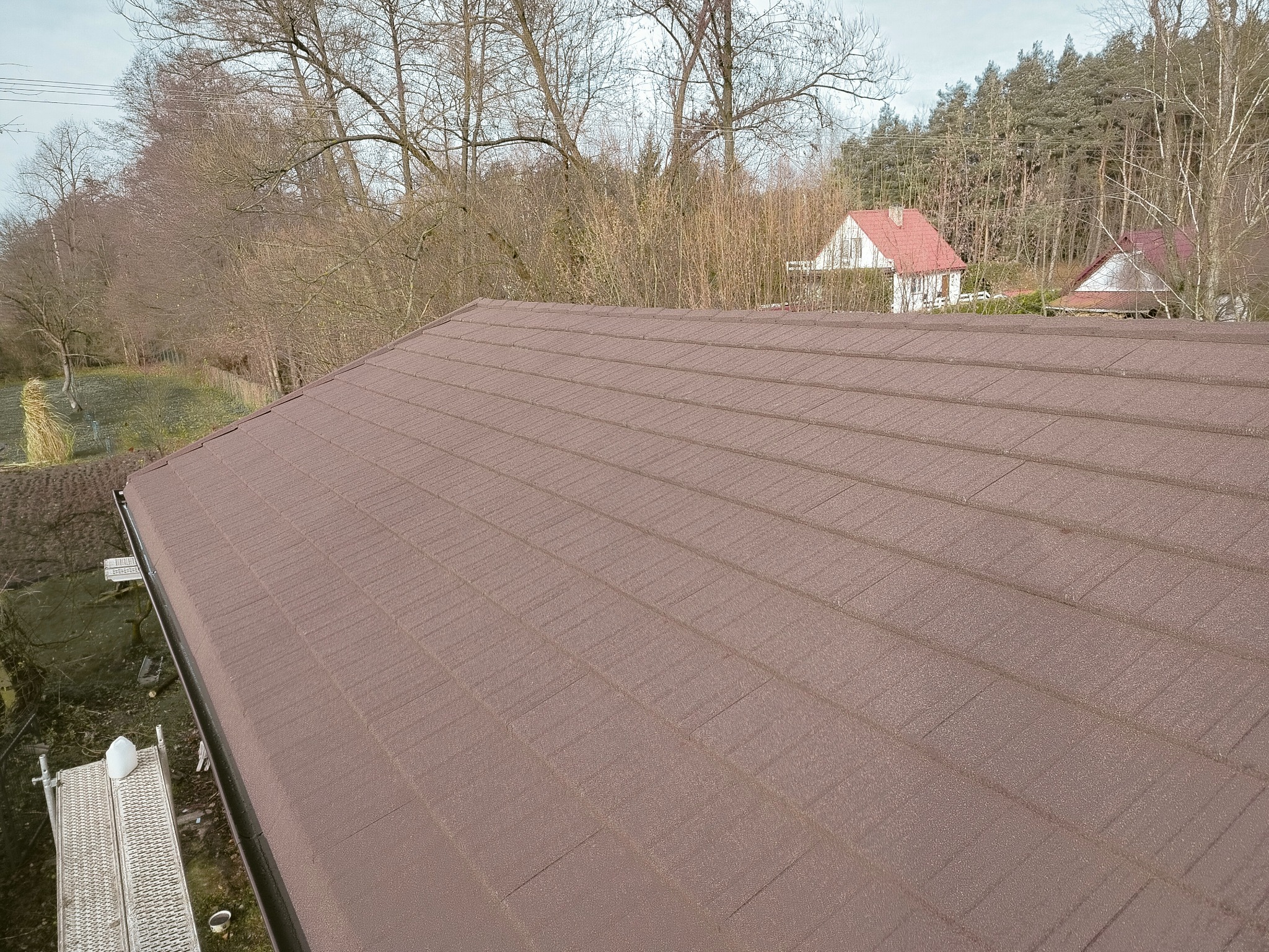 Wykonanie poszycia z blachy z posypką Gerard