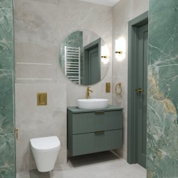 PRZEMYSŁAW RUCIŃSKI PERFEKT INTERIORS - Nowoczesna łazienka z zielonymi marmurowymi płytkami, okrągłym lustrem i złotymi akcentami. Umywalka nablatowa na szafce z frezowanymi frontami.