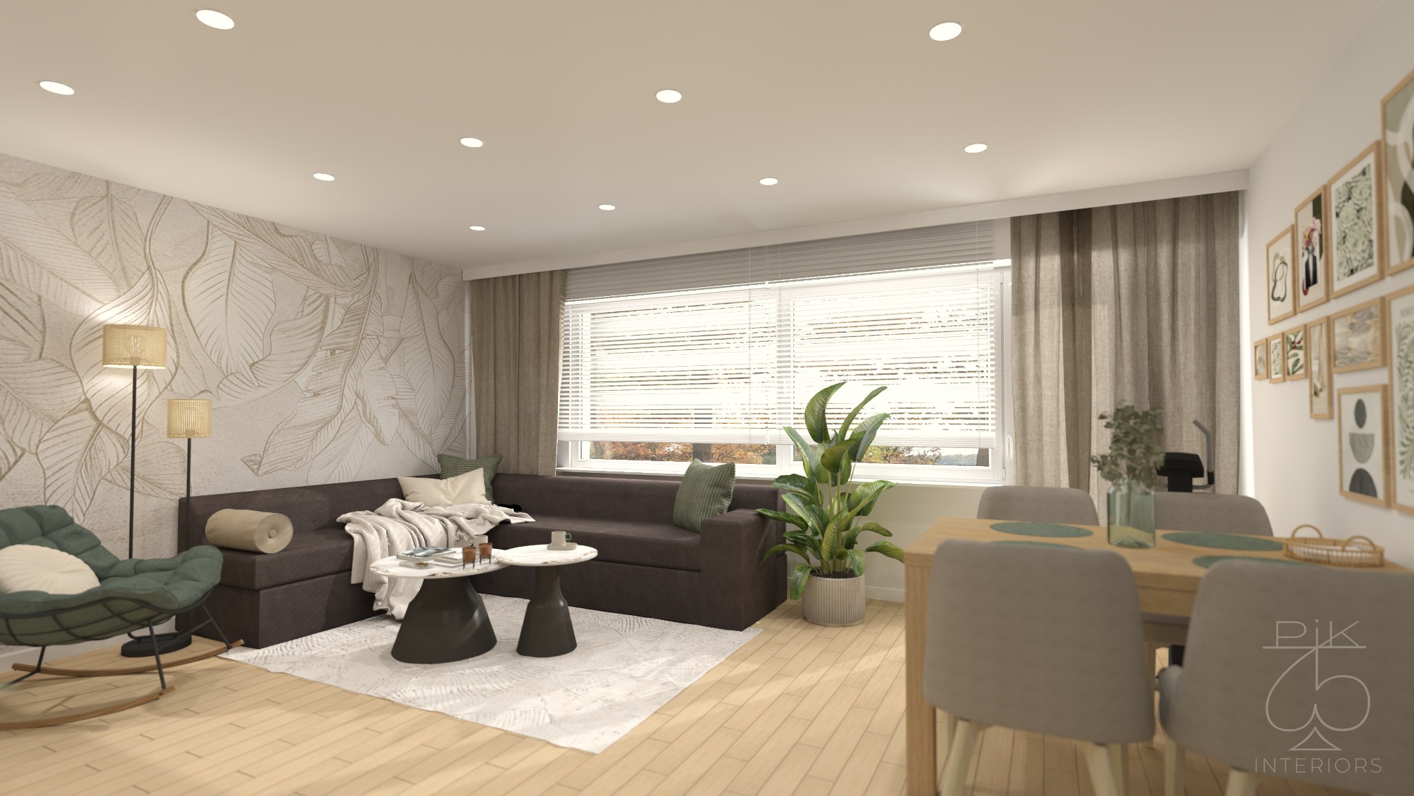 Salon po metamorfozie w Bełchatowie: ciemna sofa, wzorzysta tapeta z motywem liści, drewniana podłoga i okrągłe stoliki kawowe. Jasne, naturalne światło.