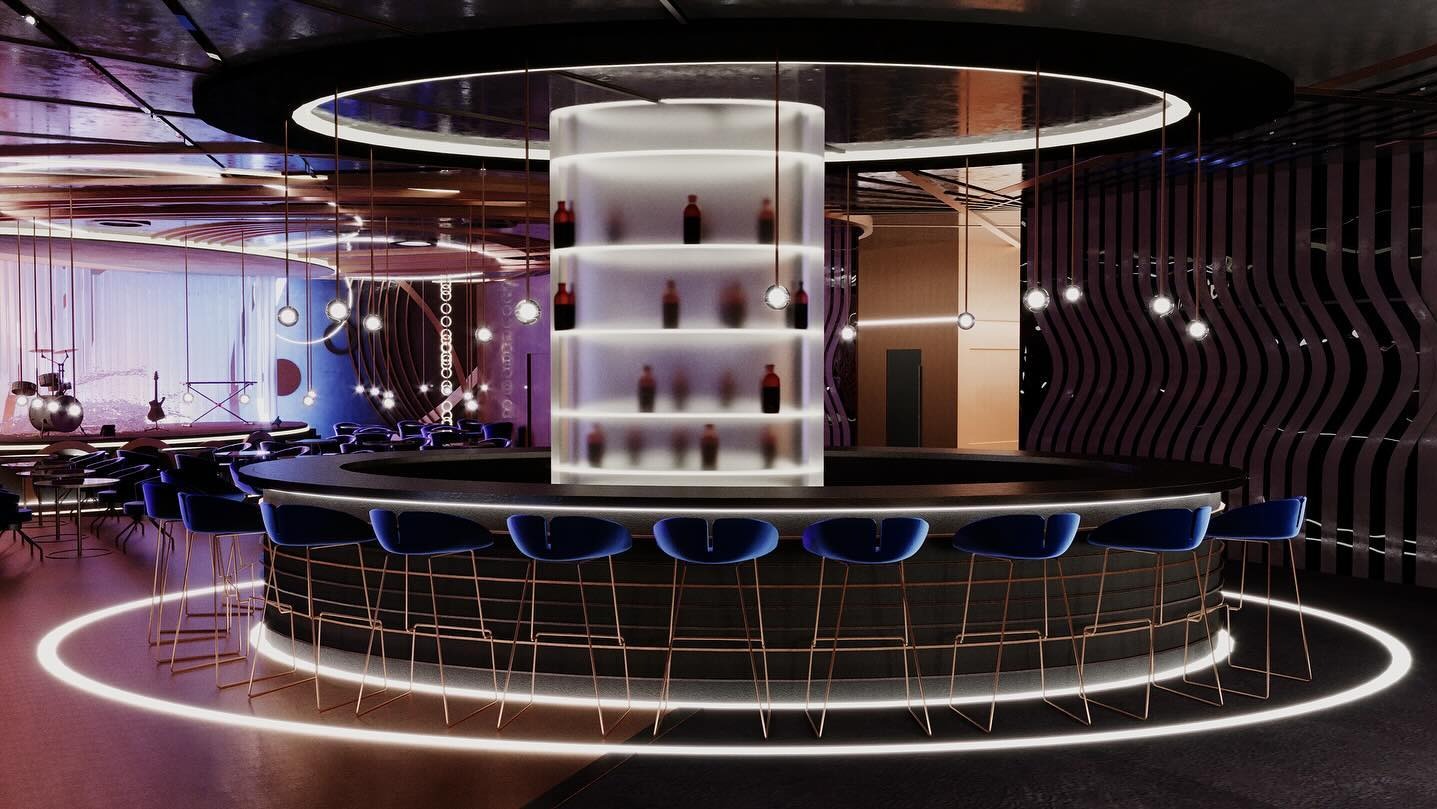 Nowoczesny bar muzyczny z okrągłym barem, niebieskimi krzesłami i podświetlaną półką na butelki. Scena muzyczna w tle. Unikalny design wnętrza.