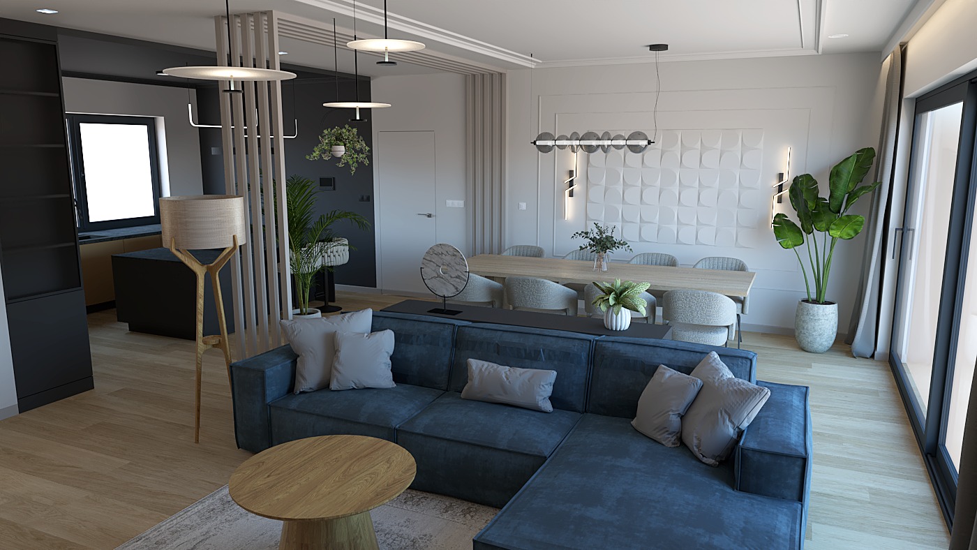 Nowoczesny salon z niebieską sofą narożną, drewnianym stolikiem kawowym i jadalnią w tle. Minimalistyczne oświetlenie i rośliny doniczkowe dodają wnętrzu przytulności.