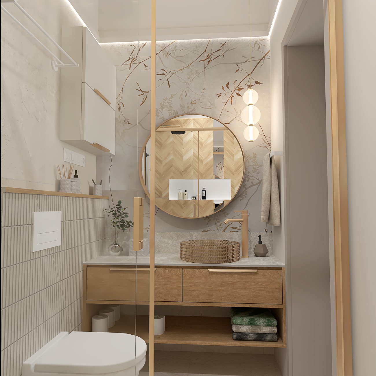 Jasna łazienka z drewnianymi akcentami: okrągłe lustro, umywalka z szafką, toaleta i dekoracyjna tapeta w gałązki. Minimalistyczny design z subtelnym oświetleniem.