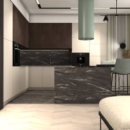 Koddo design - Nowoczesna kuchnia z wyspą i marmurowym blatem, oświetleniem LED i obrazem kobiety w kolorowym turbanie. Minimalistyczny design z elementami dekoracyjnymi.