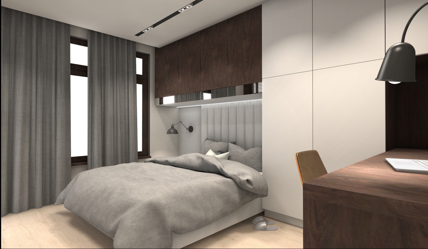 Nowoczesna sypialnia z szarą tapicerowaną ścianą za łóżkiem, drewnianymi szafkami i biurkiem. Stonowana kolorystyka, minimalistyczny design, lampka nocna i zasłony.