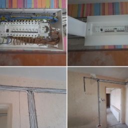 Elektro Dyżur Dmytro Shcherbyna - Rozdzielnice elektryczne w dwóch wariantach: otwarta i zamknięta, oraz kable elektryczne prowadzone po ścianach w nowym budynku przed wykończeniem.