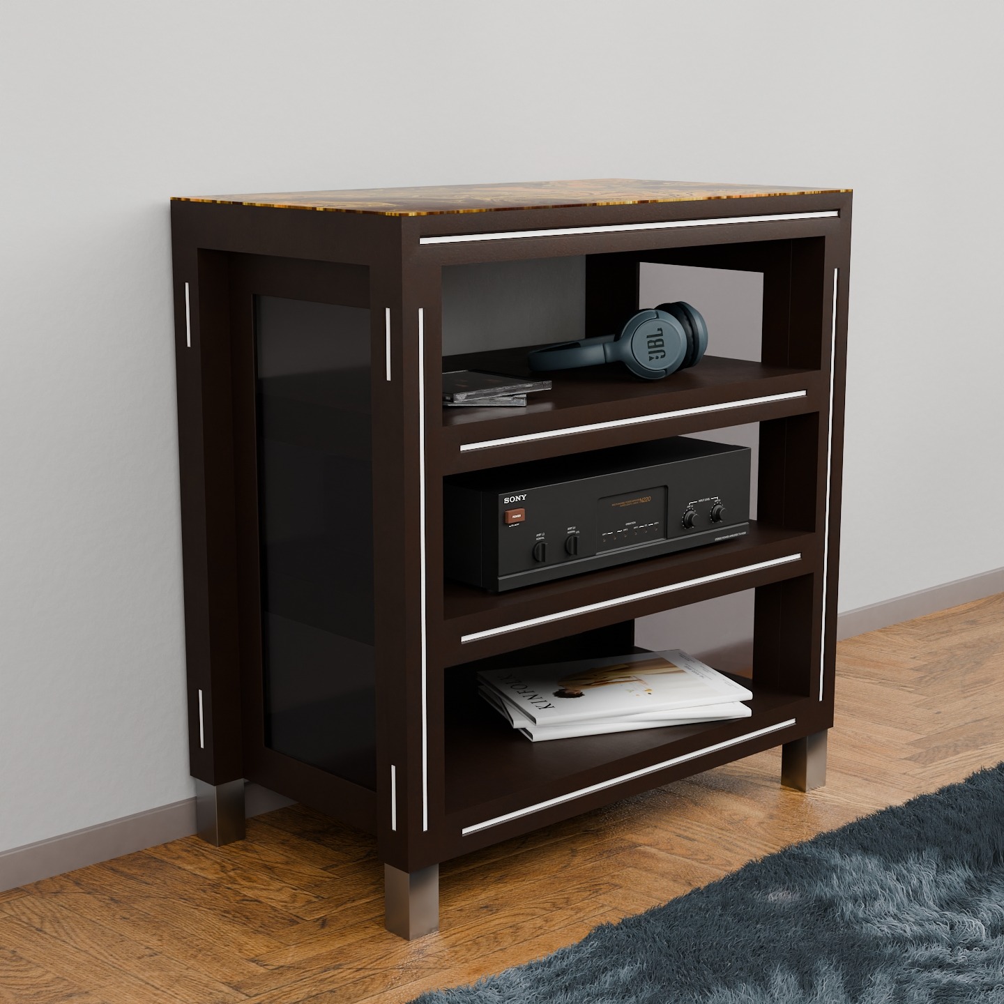 Regał RTV z ciemnego drewna z metalowymi akcentami, na którym leżą słuchawki JBL, wzmacniacz Sony i magazyn. Widoczne drewniane podłogi i fragment niebieskiego dywanu.