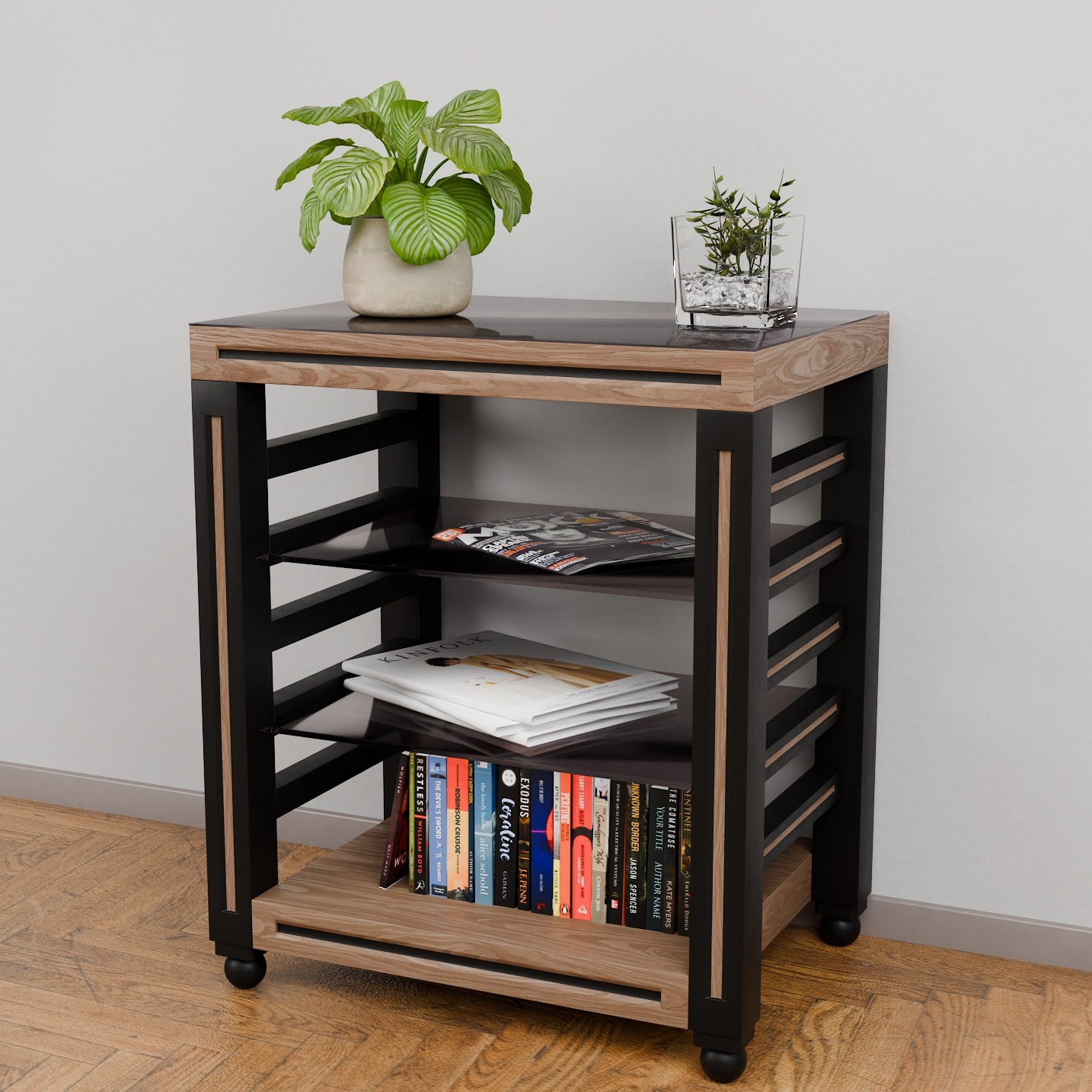 Stolik RTV z półkami z czarnego szkła, na kółkach, z książkami i roślinami. Konstrukcja z drewna i czarnych elementów. Ujęcie w neutralnym oświetleniu.